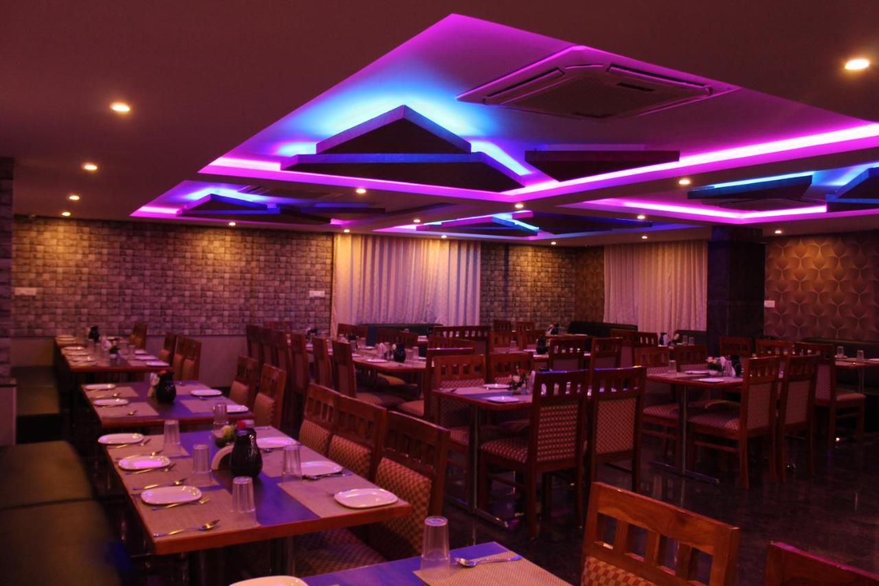 Golden Pride Hotel Kanakapura Buitenkant foto