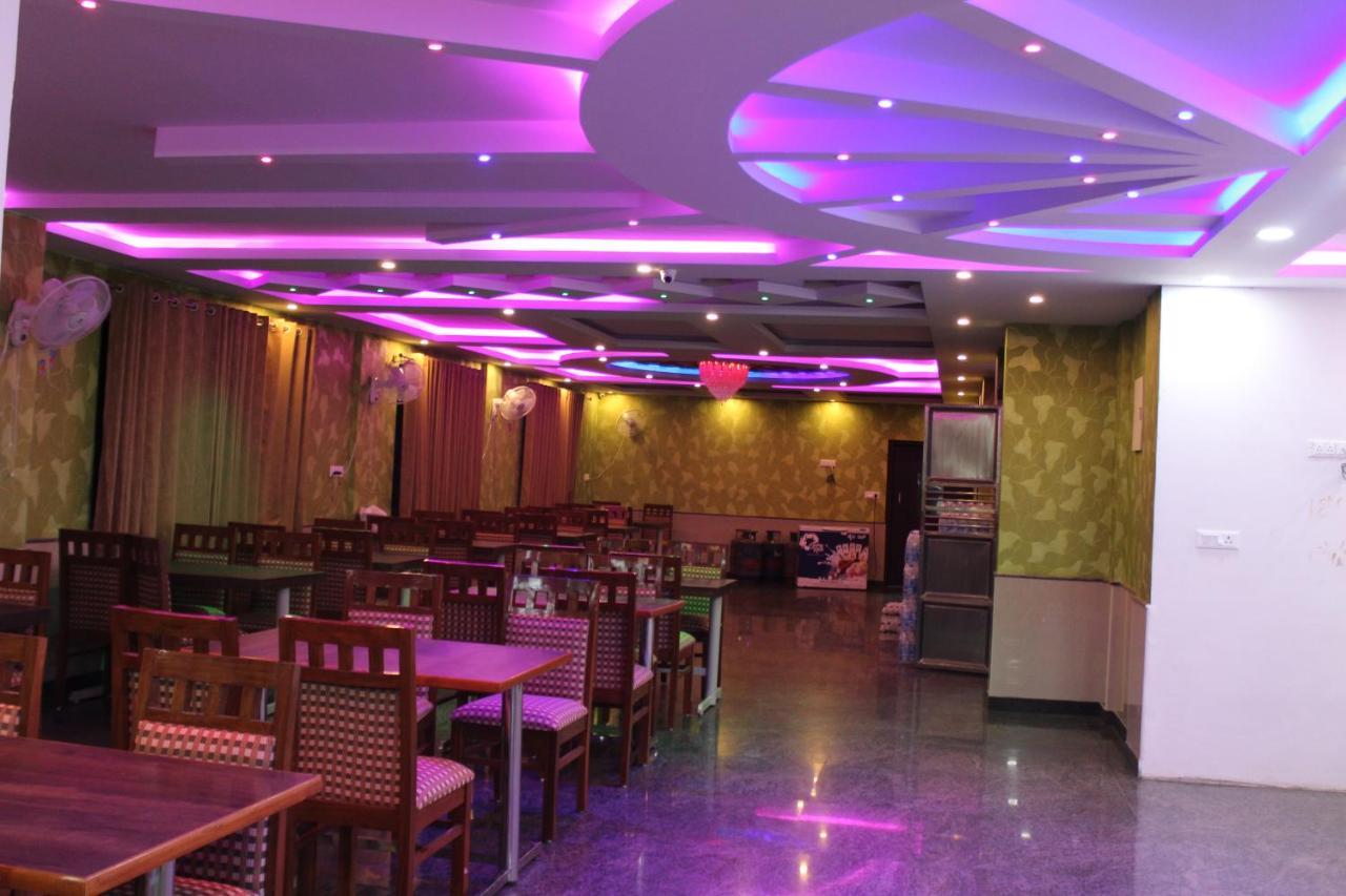 Golden Pride Hotel Kanakapura Buitenkant foto