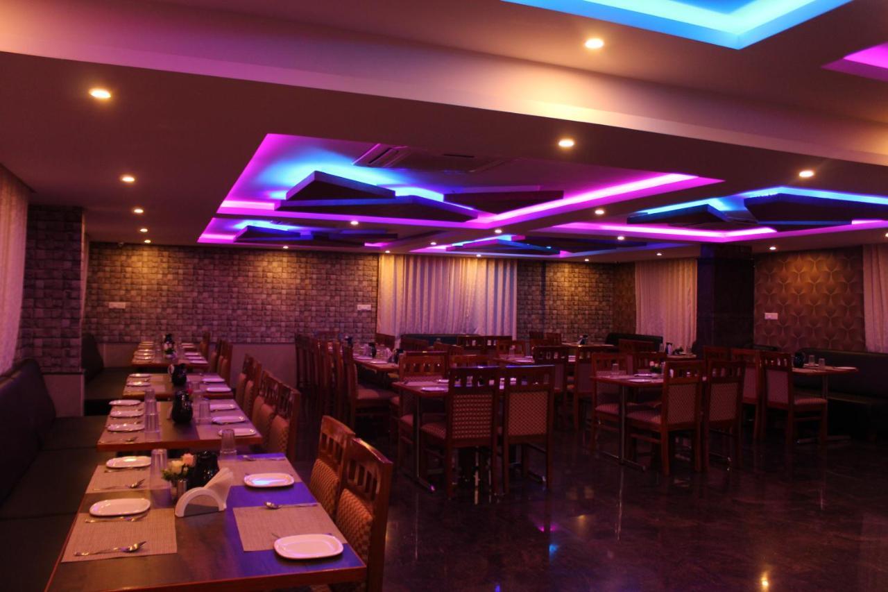 Golden Pride Hotel Kanakapura Buitenkant foto